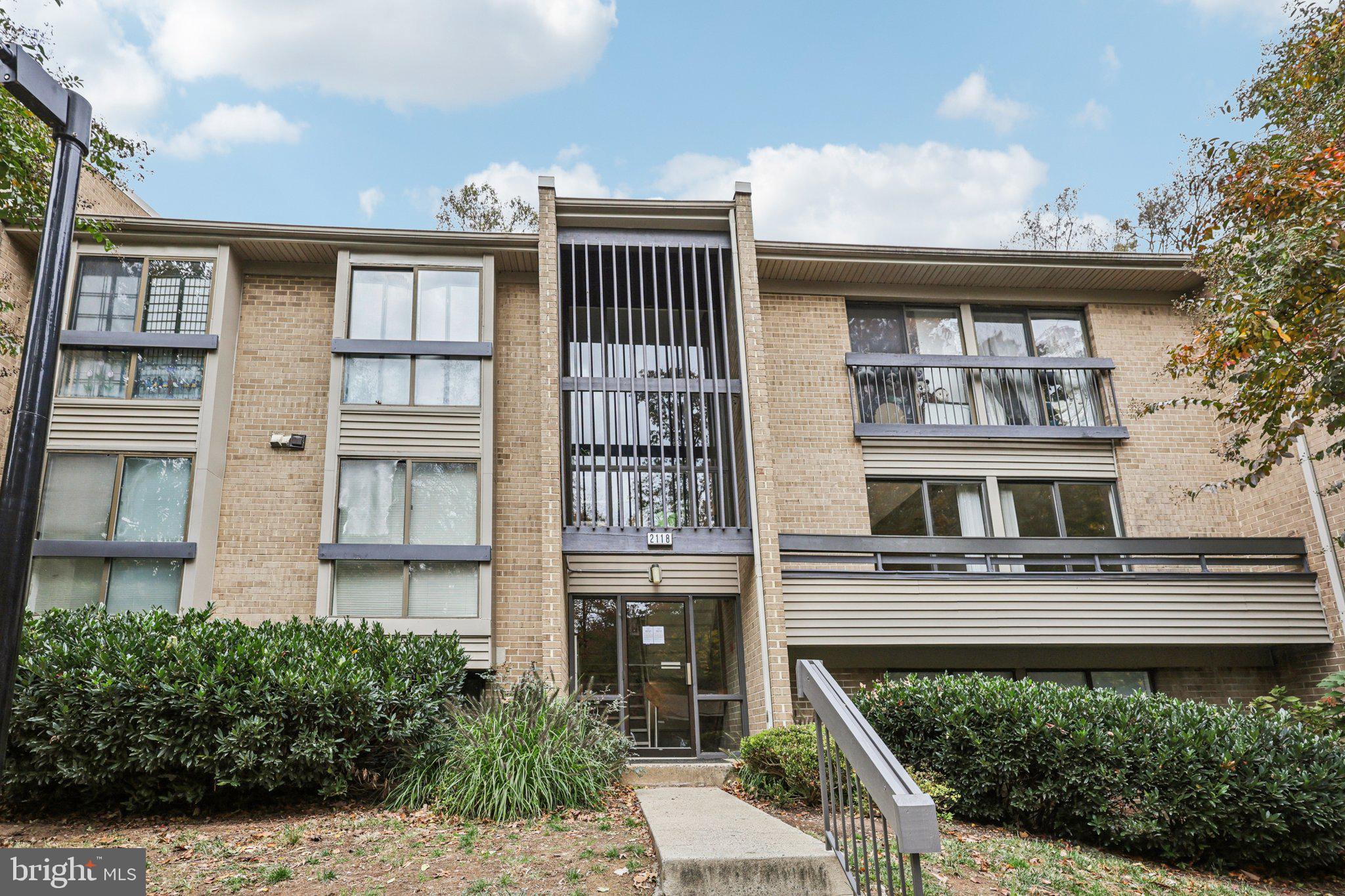 2118 Green Watch Way, Unit 10/201C Reston, VA 20191 - Photo 1 of 30 front view of a building