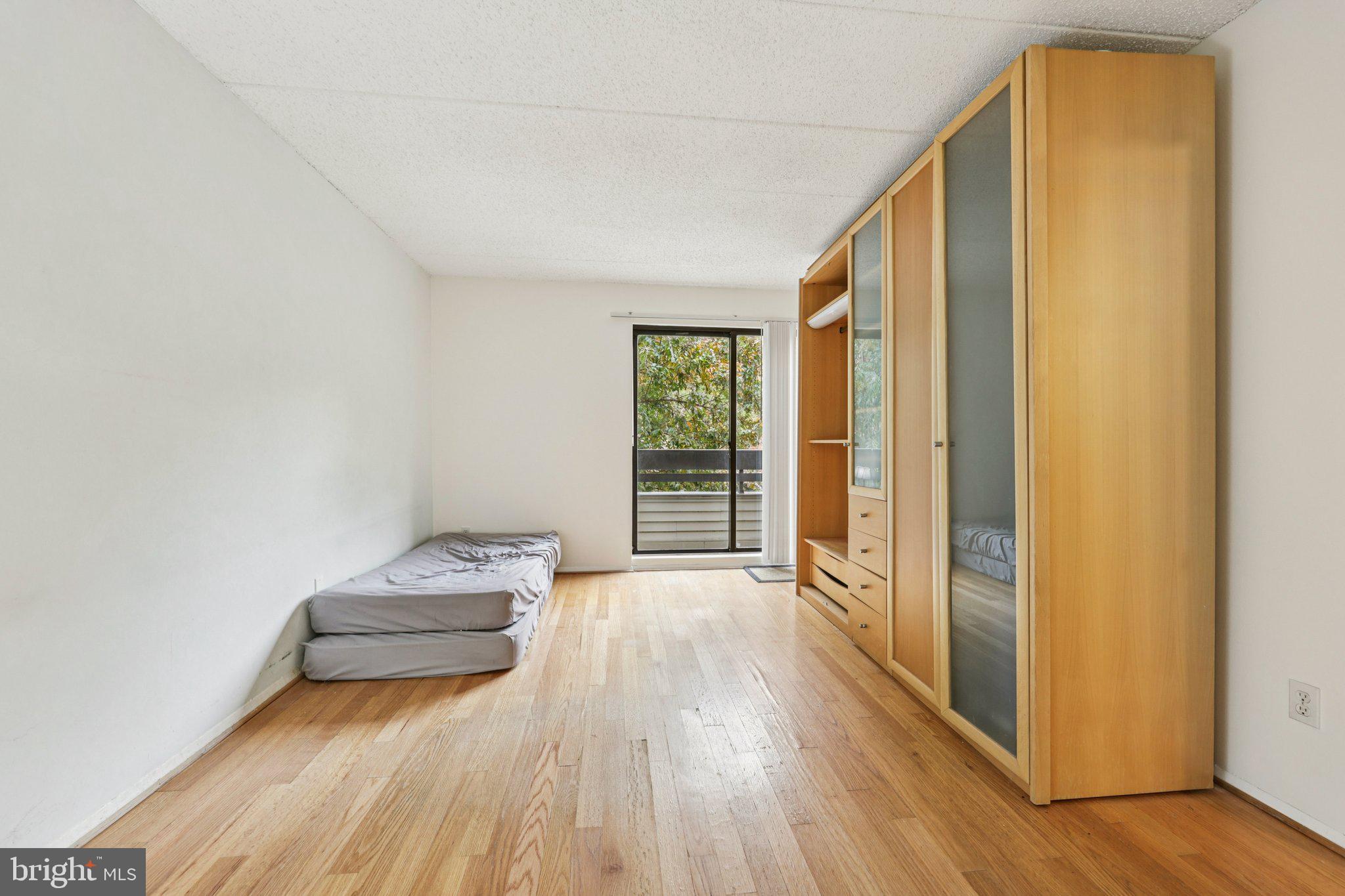2118 Green Watch Way, Unit 10/201C Reston, VA 20191 - Photo 14 of 30 a view of livingroom with hardwood