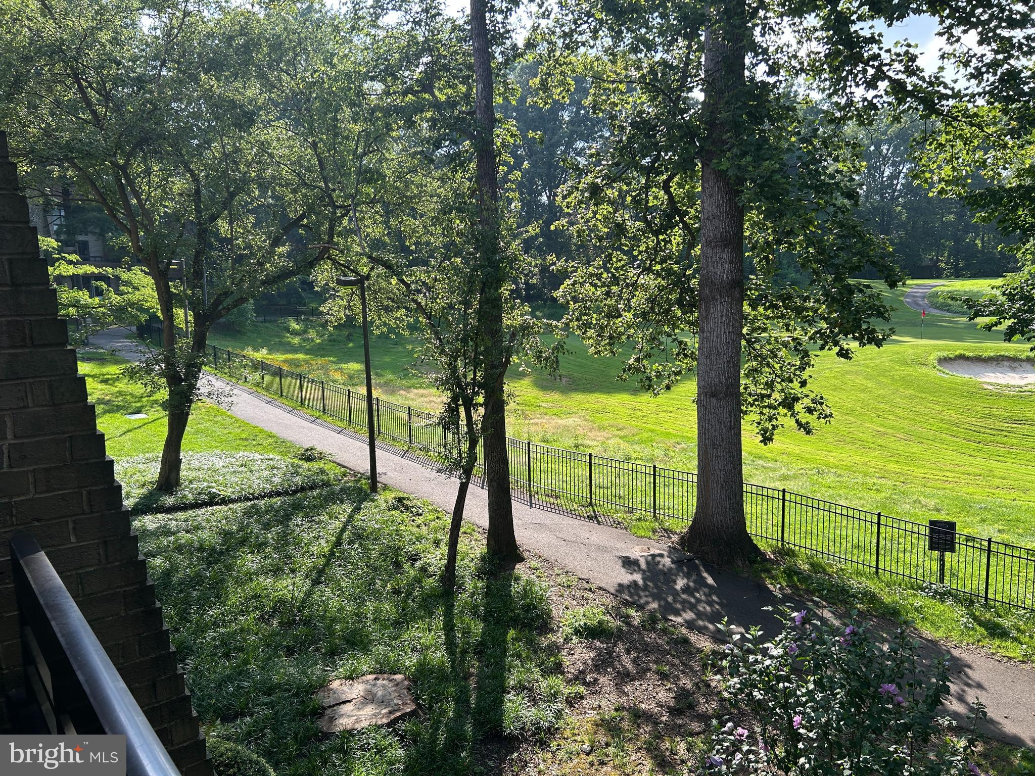 2118 Green Watch Way, Unit 10/201C Reston, VA 20191 - Photo 24 of 30 a view of a park with plants and large trees
