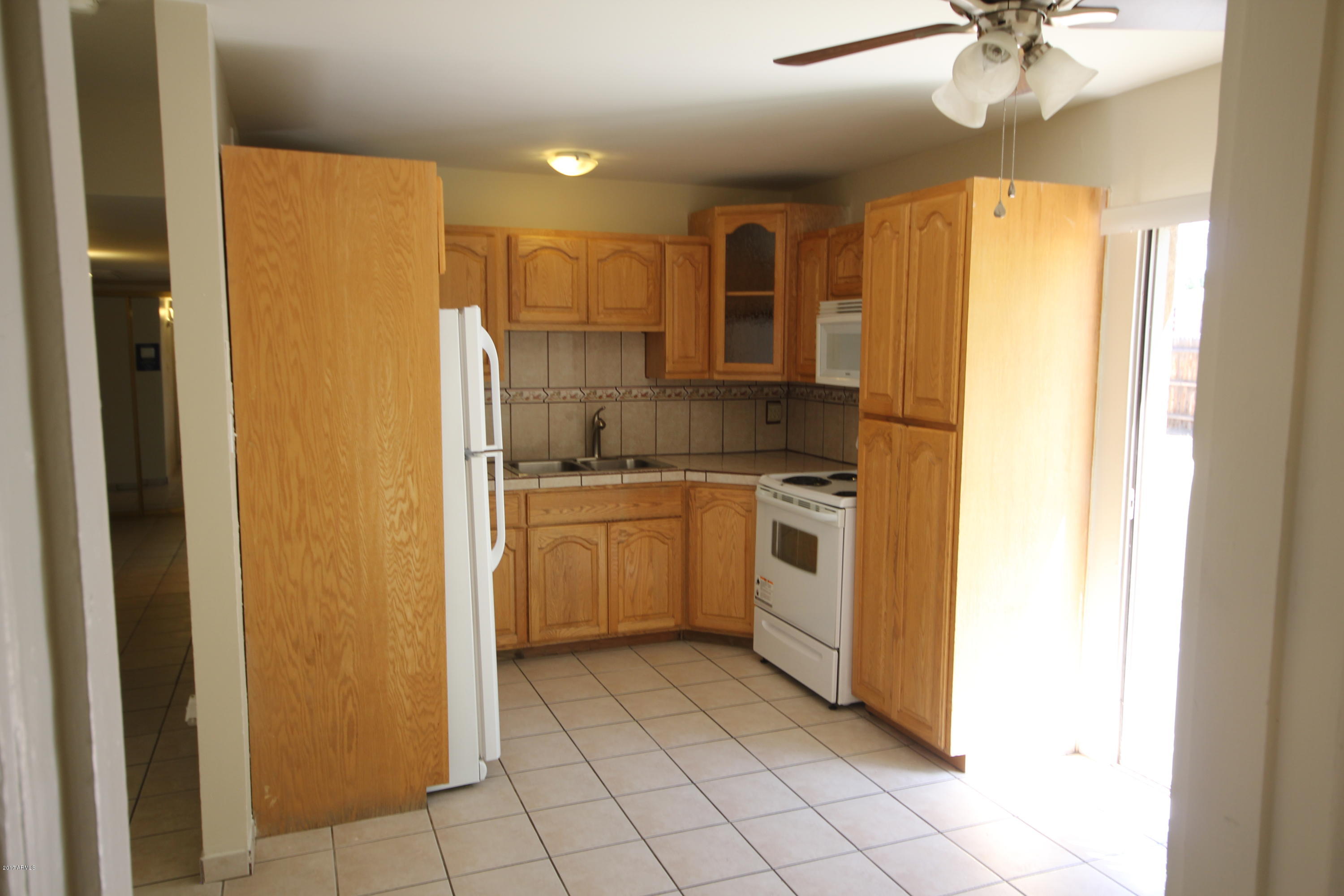 1611 West Vineyard Road Phoenix, AZ 85041 - Photo 3 of 22 IMG_3494