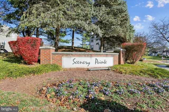 a view of a street with sign board