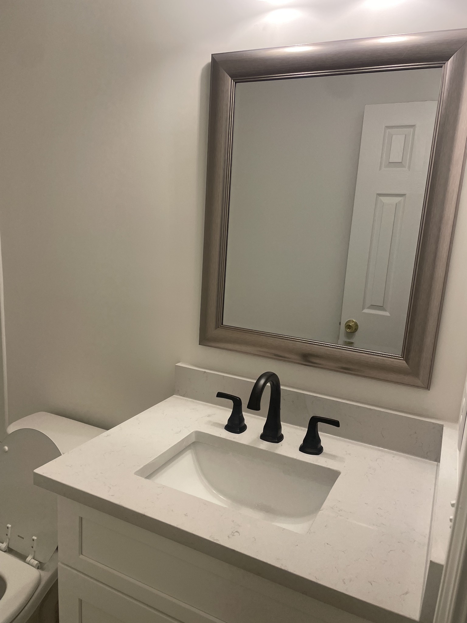 1039 Tylertown Road Clarksville, TN 37040 - Photo 13 of 20 a bathroom with a sink and a mirror