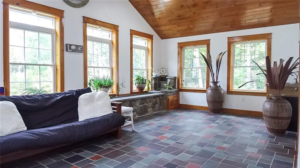 280 South Stanley Hill Road China, ME 04358 - Photo 4 of 34 Heated sun-room with garden & waterfall