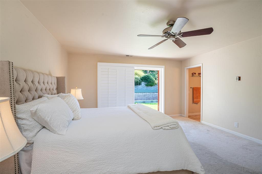 2506 Windmill View Road El Cajon, CA 92020 - Photo 12 of 25 MASTER FEATURES 2 ENORMOUS WALK IN CLOSETS, EN SUITE BATHROOM AND PLANTATION SHUTTERS