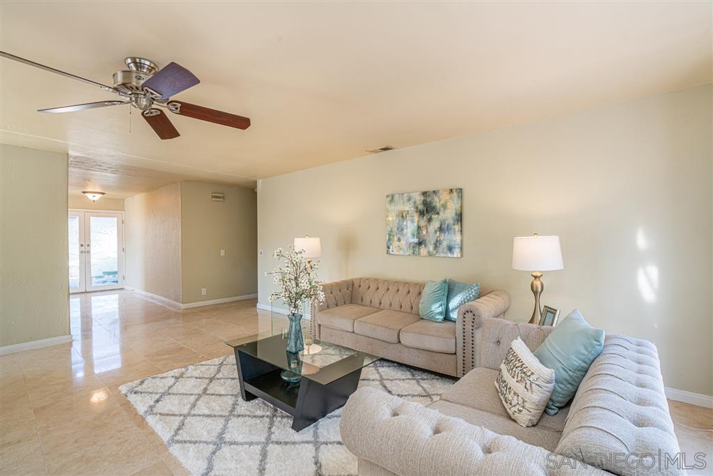 2506 Windmill View Road El Cajon, CA 92020 - Photo 6 of 25 FAMILY RM IS ADJACENT TO KITCHEN. LARGE ENOUGH TO ACCOMODATE A BIG GATHERING. FORMAL LIVING ROOM IS AT FRONT OF THE HOME