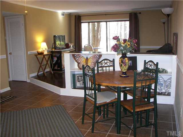641 Pine Ridge Place Raleigh, NC 27609 - Photo 2 of 25 a view of a dining room with furniture and window