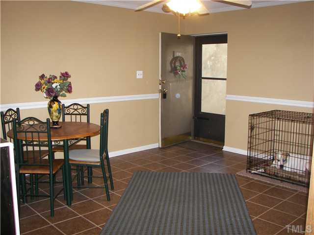 641 Pine Ridge Place Raleigh, NC 27609 - Photo 6 of 25 a view of a dining room with furniture