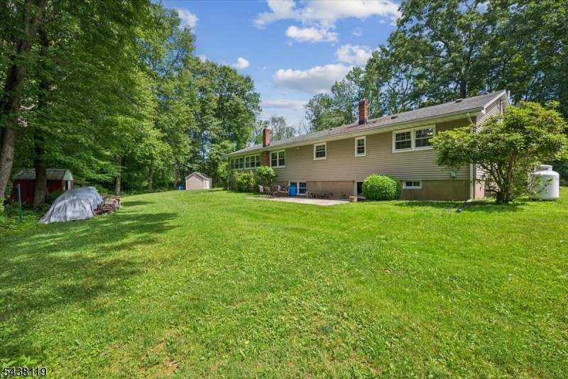 335 Drakestown Road Long Valley, NJ 07853 - Photo 28 of 34 a view of a house with a yard and sitting area