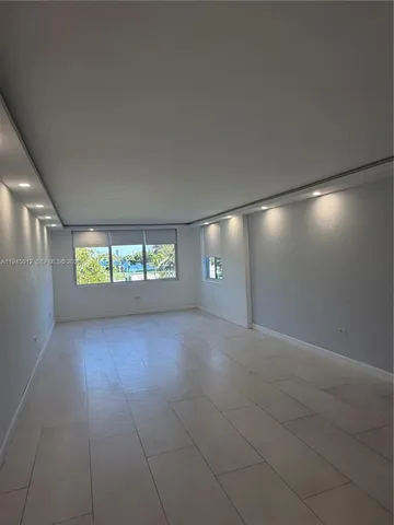 a view of a street with an outdoor seating