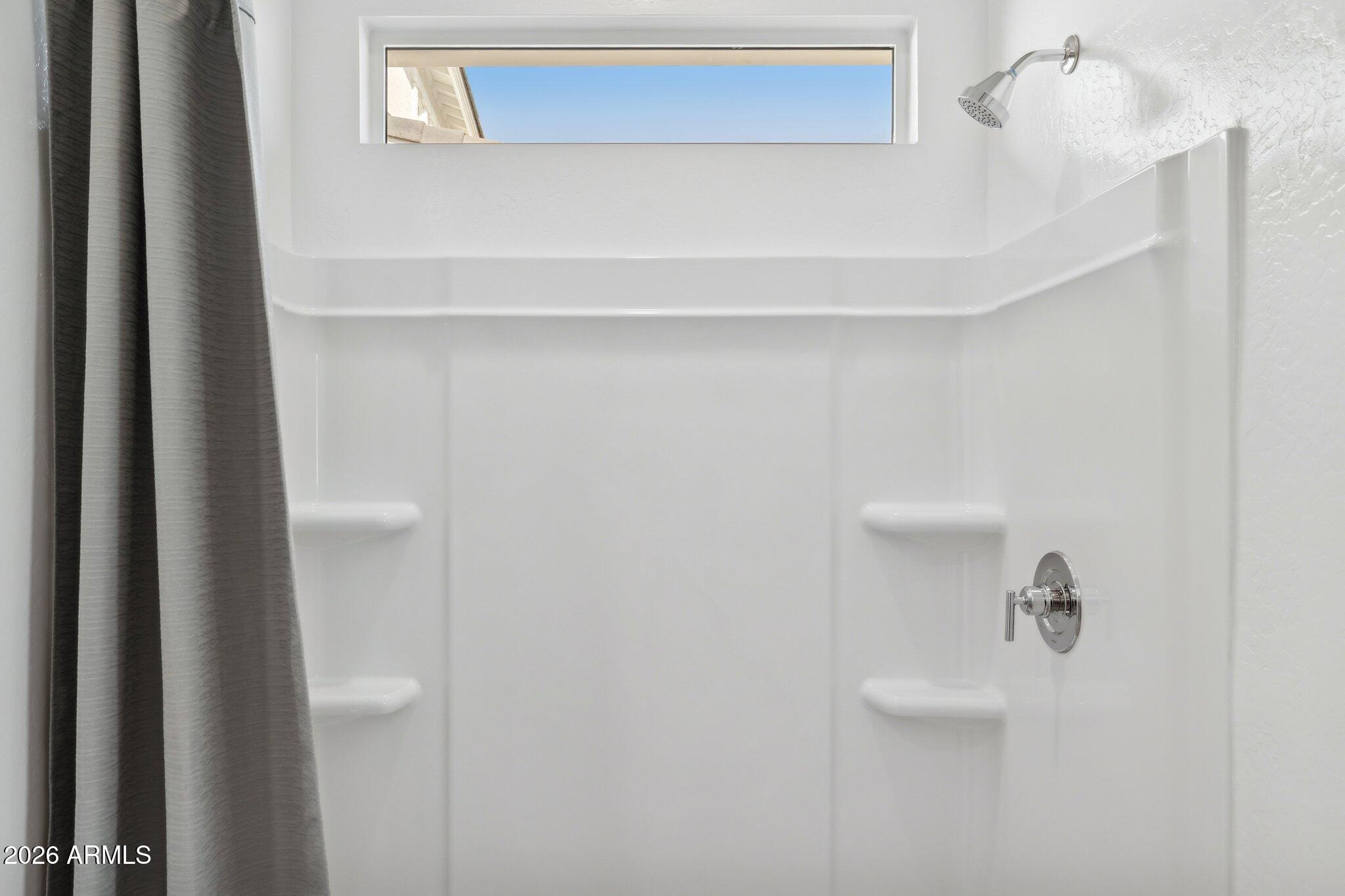 26449 West Crown King Road Buckeye, AZ 85326 - Photo 19 of 33 a close view of a bathtub in bathroom