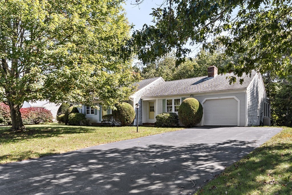111 Seth Parker Road Barnstable, MA 02632 - Photo 1 of 27 a front view of house with yard and trees