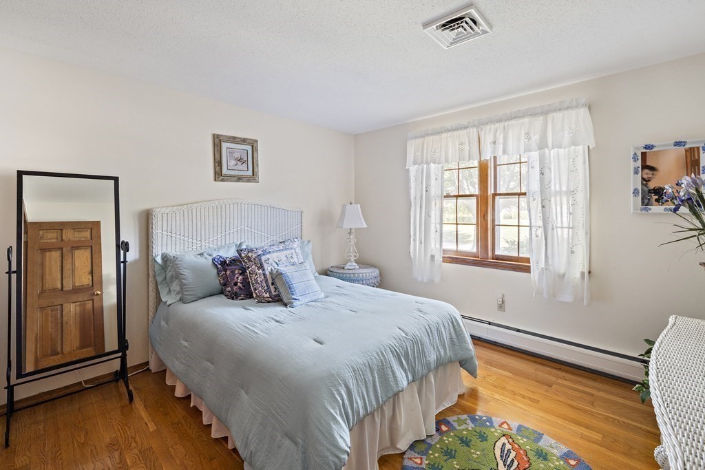 111 Seth Parker Road Barnstable, MA 02632 - Photo 23 of 27 a bedroom with a bed and a window