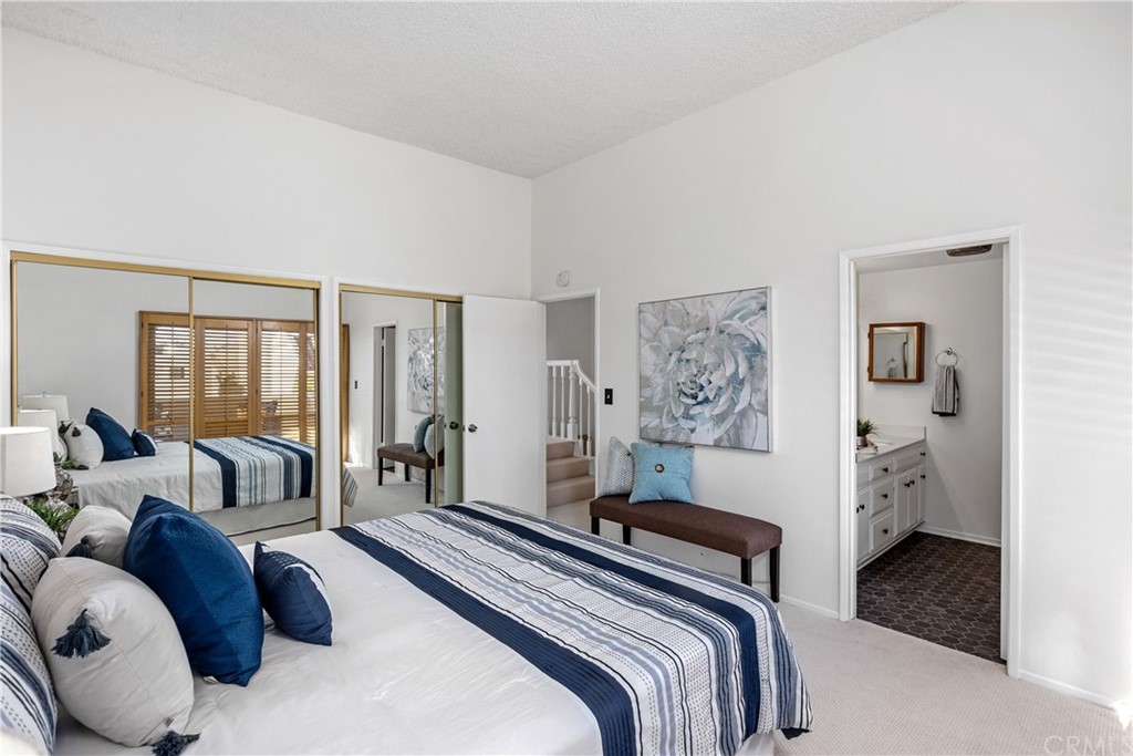 259 Valley Drive Hermosa Beach, CA 90254 - Photo 20 of 34 a bedroom with a large bed and a couch