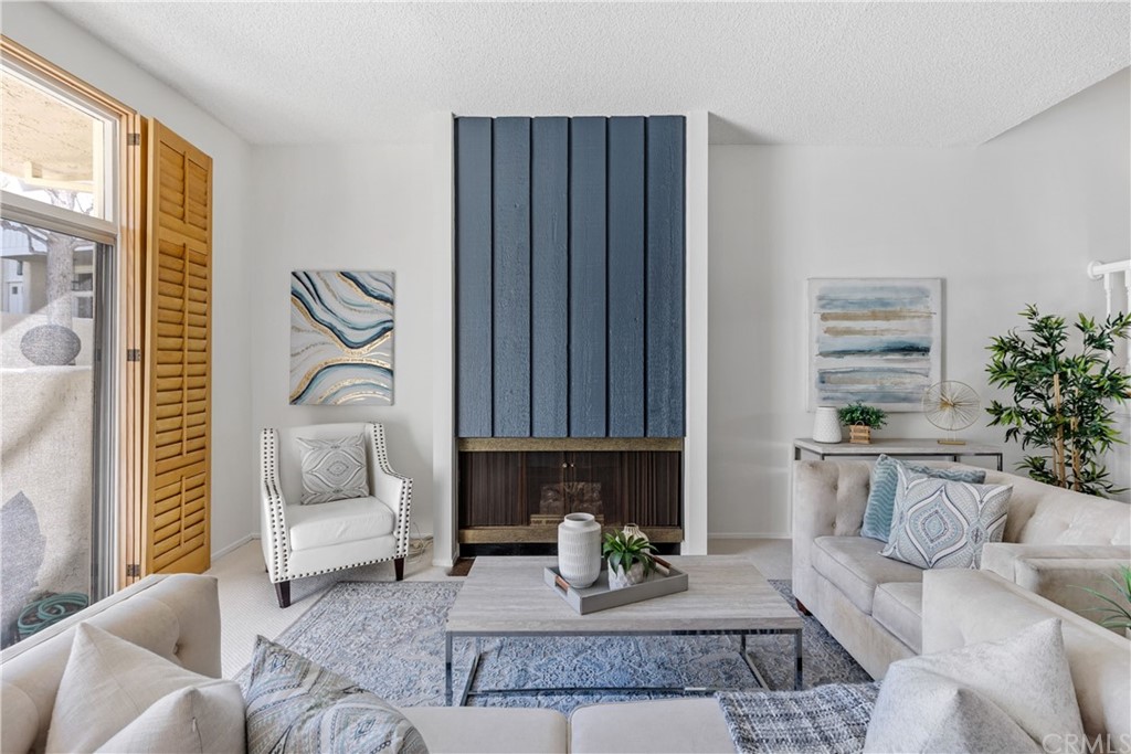 259 Valley Drive Hermosa Beach, CA 90254 - Photo 3 of 34 a living room with furniture and a potted plant
