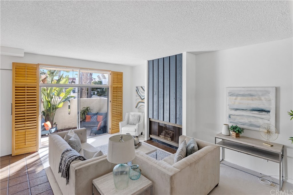 259 Valley Drive Hermosa Beach, CA 90254 - Photo 5 of 34 a living room with furniture and a large window
