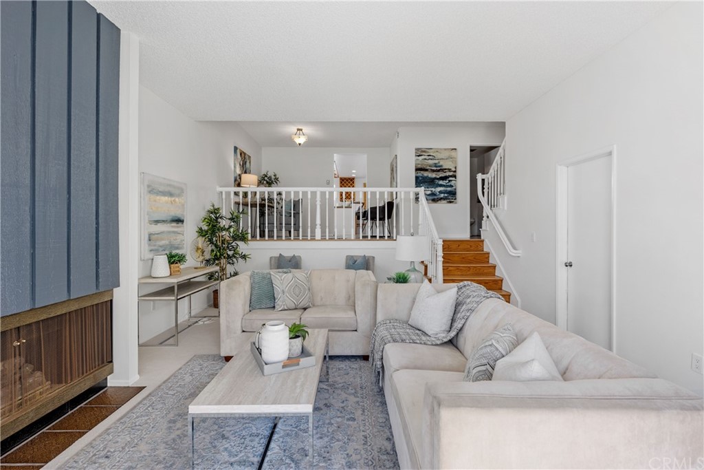 259 Valley Drive Hermosa Beach, CA 90254 - Photo 6 of 34 a living room with furniture and a book shelf