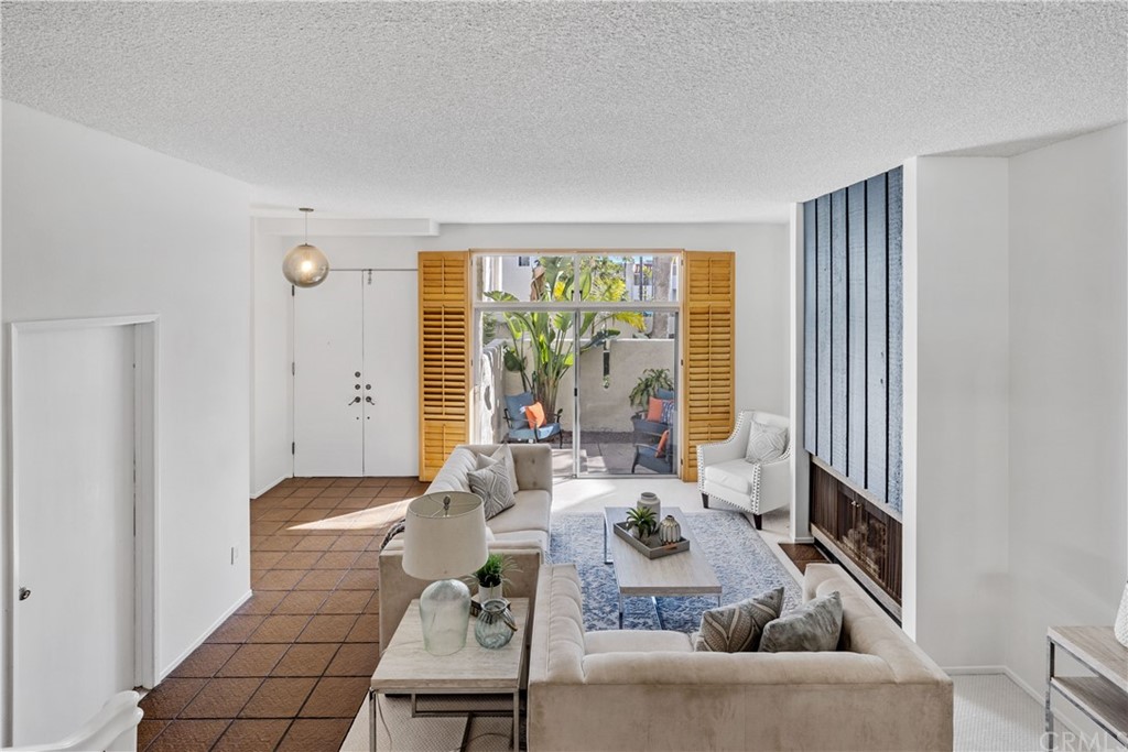 259 Valley Drive Hermosa Beach, CA 90254 - Photo 7 of 34 a living room with furniture and a large window