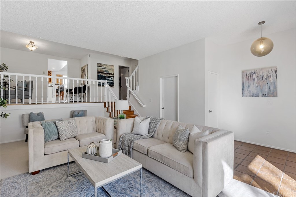 259 Valley Drive Hermosa Beach, CA 90254 - Photo 8 of 34 a living room with furniture and cabinets