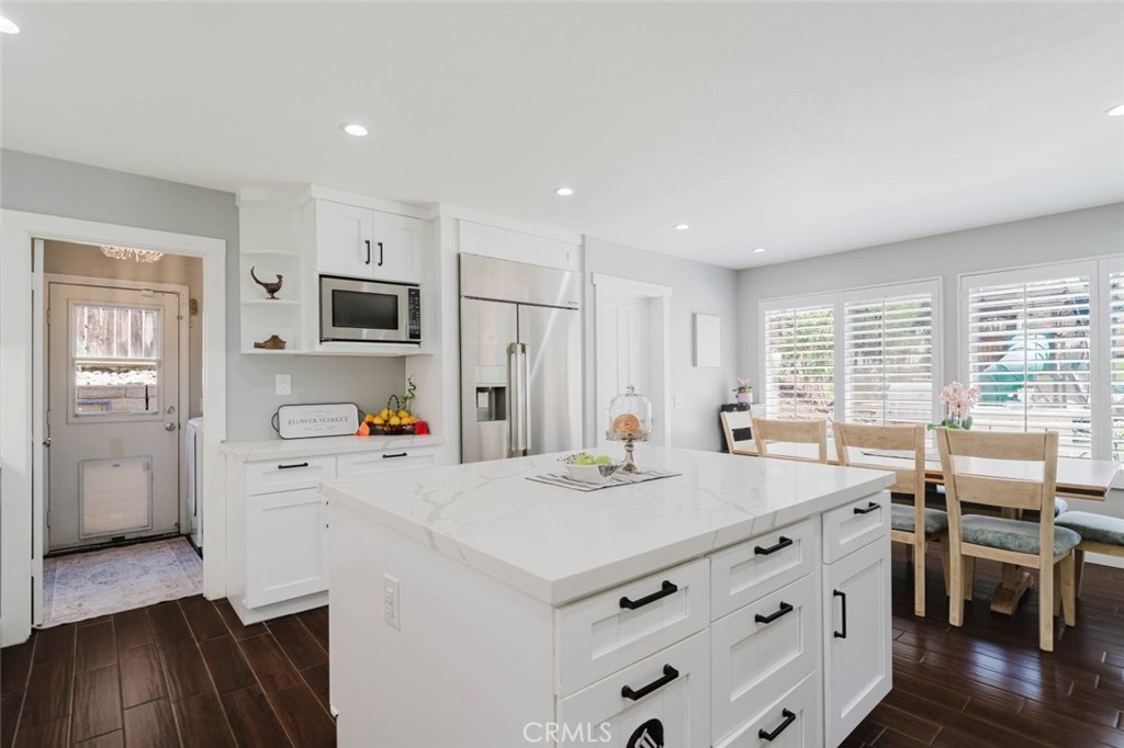32480 The Old Road Castaic, CA 91384 - Photo 23 of 68 a view of kitchen with sink microwave and refrigerator