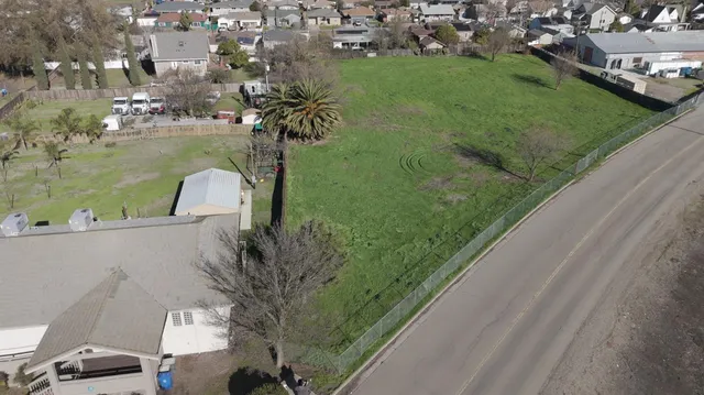 an aerial view of a city with lots of residential buildings