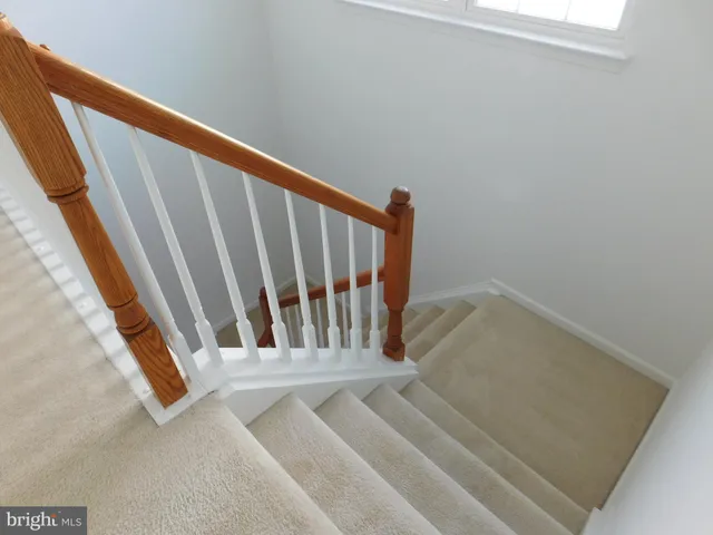 a view of a hallway with closet