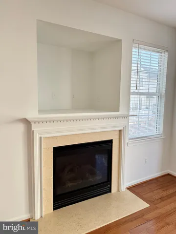 a living room with a fireplace in it