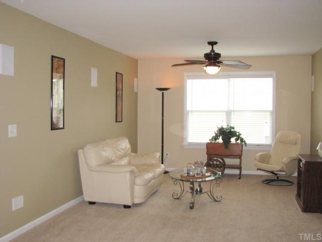 125 Locke Woods Road Raleigh, NC 27603 - Photo 10 of 12 The expansive loft enjoys a distributed audio system and a distinctive ceiing fan.