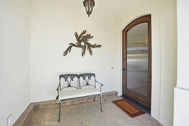 a bedroom with a bed and ceiling fan