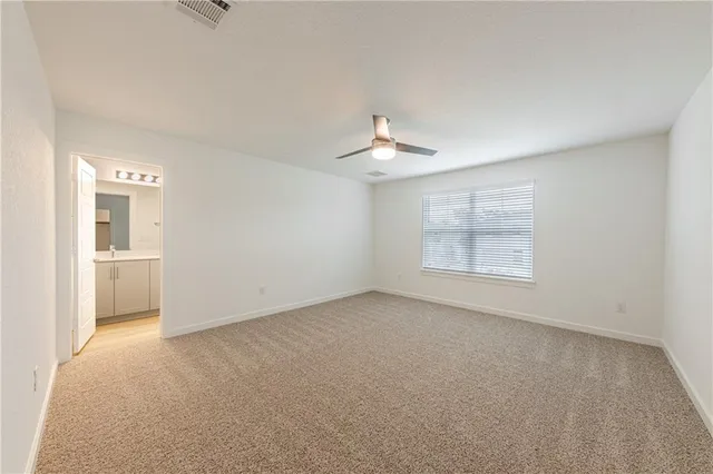 a view of storage and utility room with washer and dryer