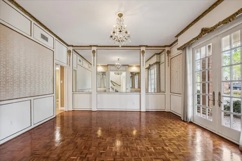 a view of a room with windows