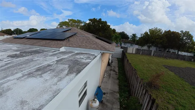 a utility room with sink dryer and washer