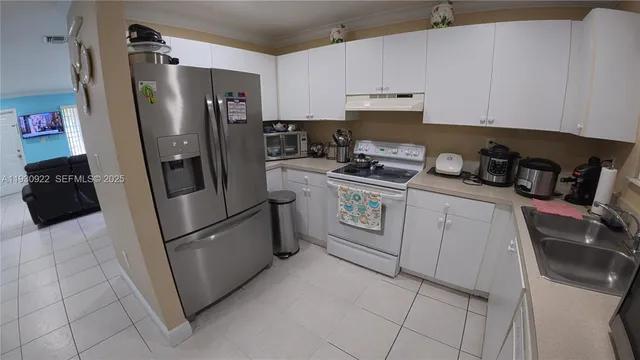 $630,000 | 16220 Northwest 41st Avenue, Miami Gardens, FL 33054