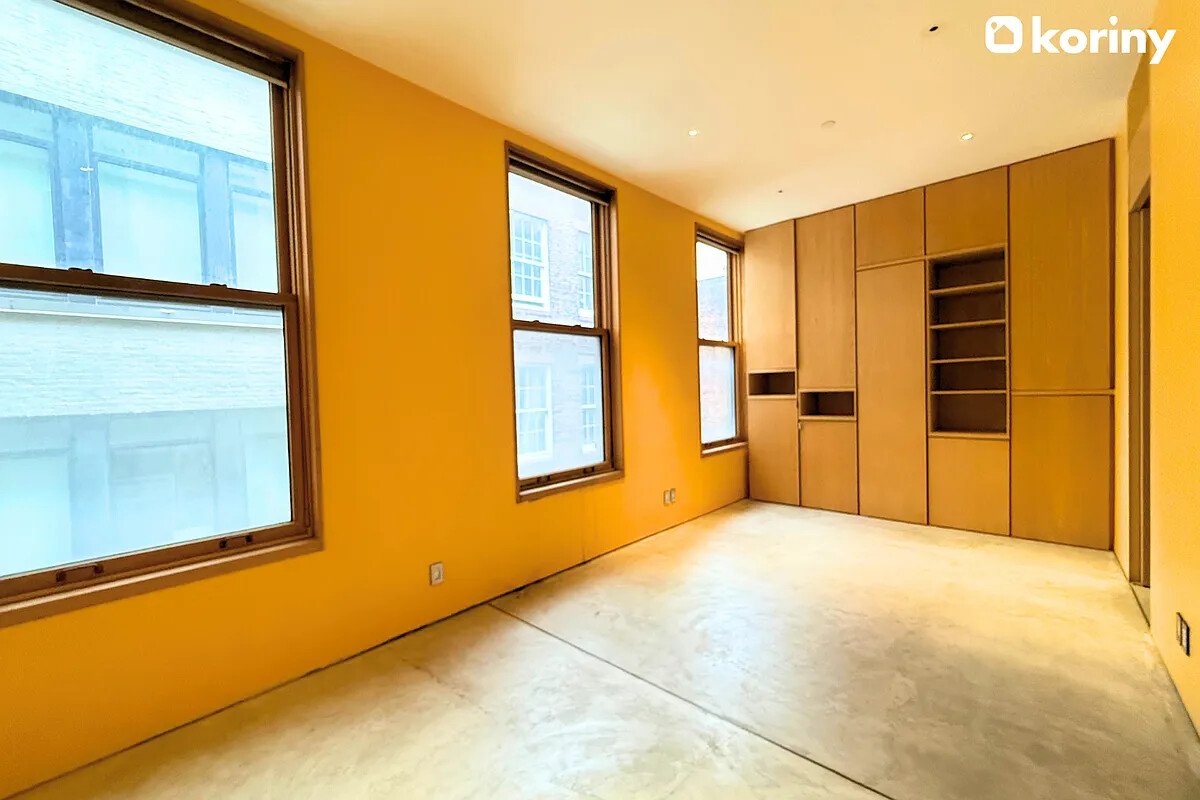 75 Warren Street Brooklyn, NY 11201 - Photo 16 of 39 a view of an empty room with window