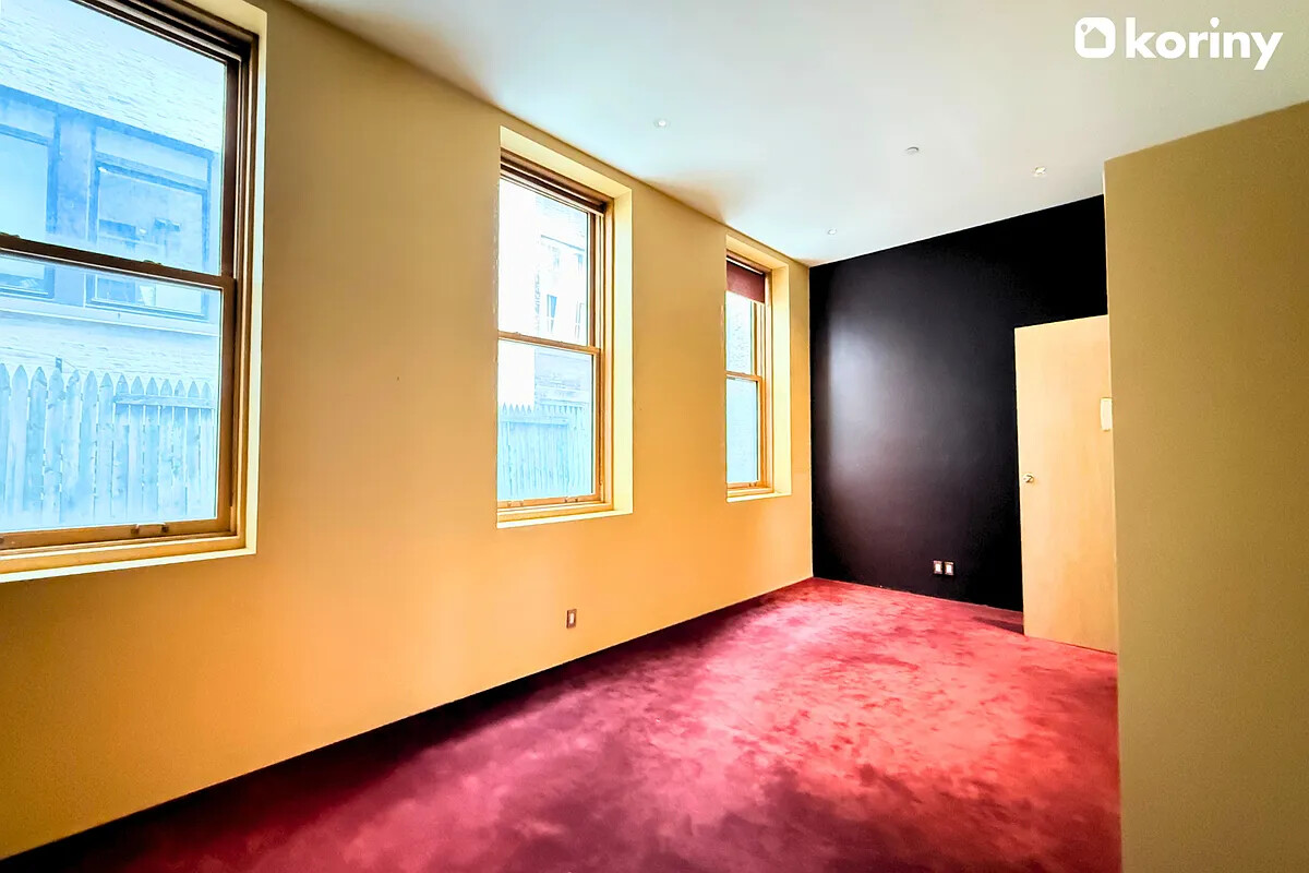 75 Warren Street Brooklyn, NY 11201 - Photo 9 of 39 a view of an empty room with a window