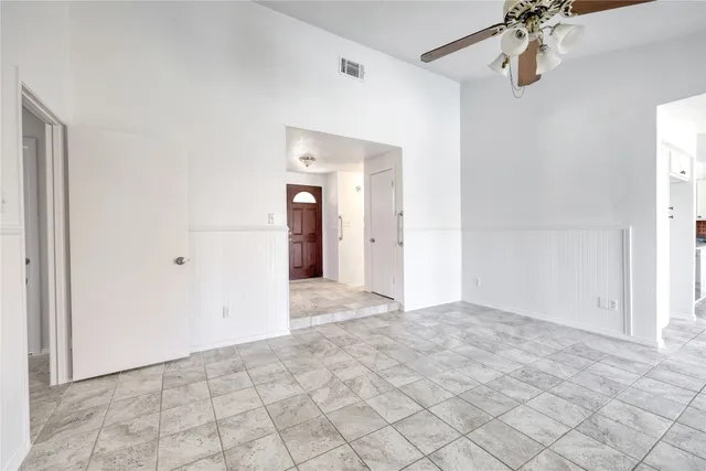 a view of a hallway view with staircase