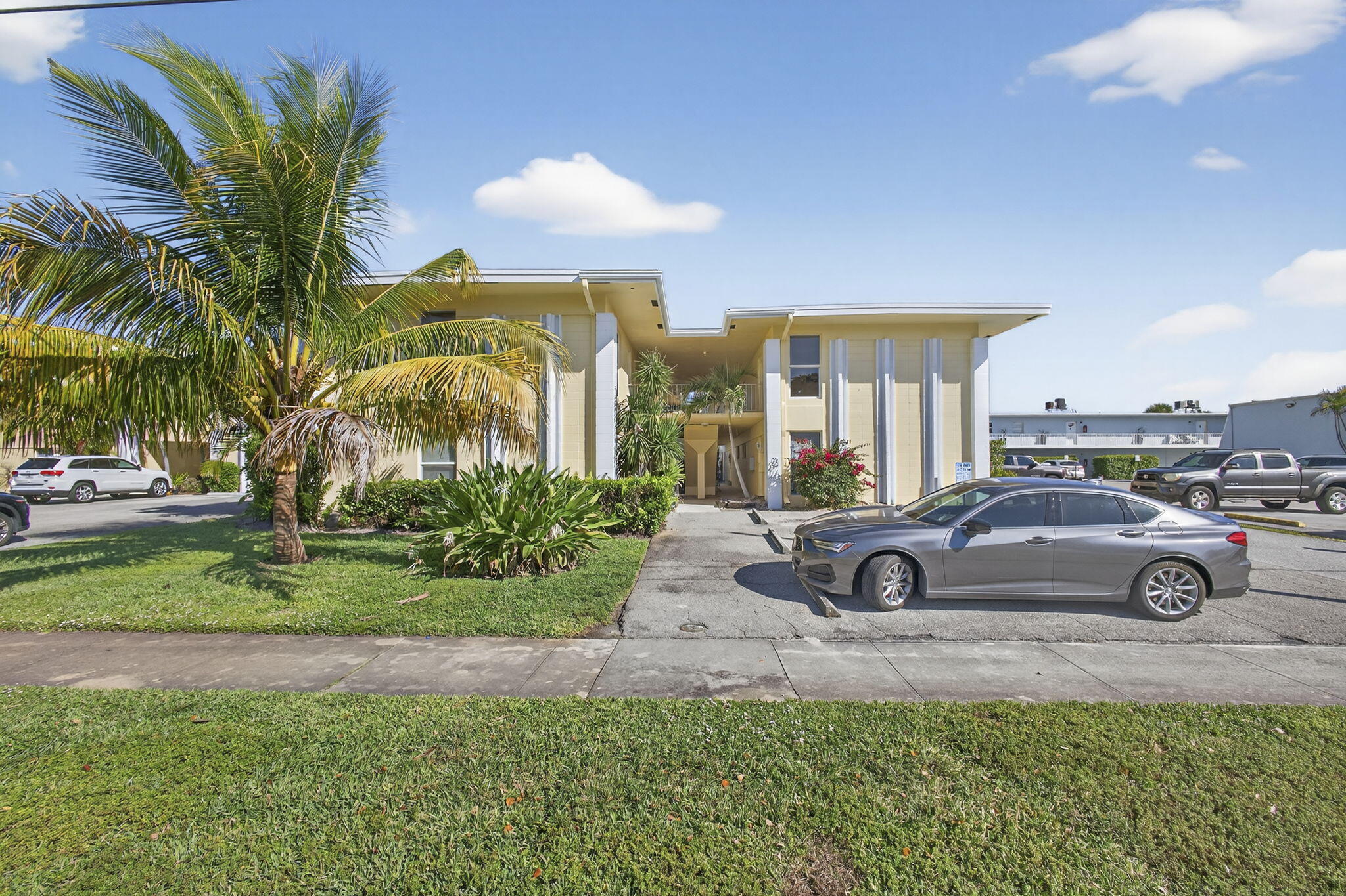 a view of yard with car parked