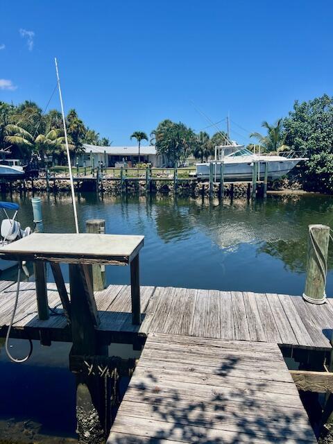 727 Hummingbird Way, Unit 1 North Palm Beach, FL 33408 - Photo 11 of 13 a lake view with a lake view