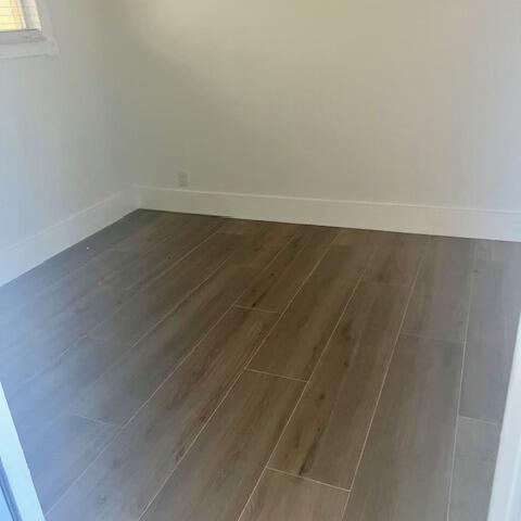 727 Hummingbird Way, Unit 1 North Palm Beach, FL 33408 - Photo 6 of 13 a view of a room with wooden floor