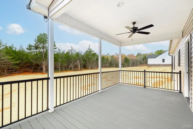 a view of a balcony with wooden floor