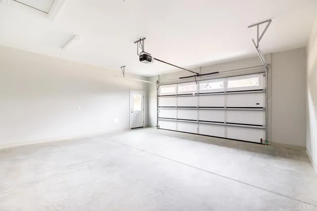 an aerial view of house with yard