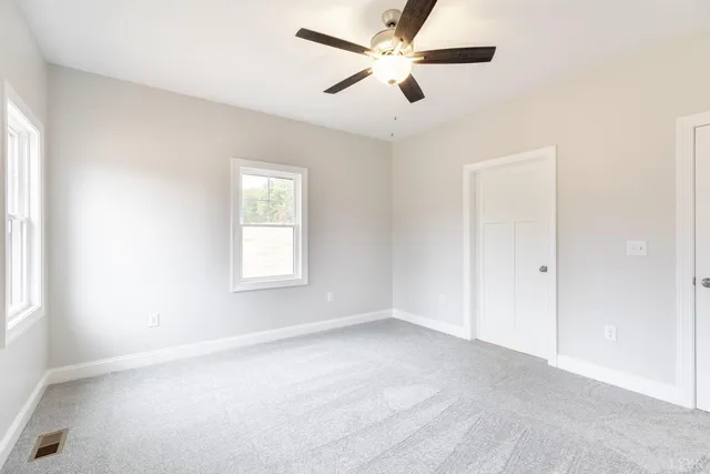 a view of a room with racks on the wall