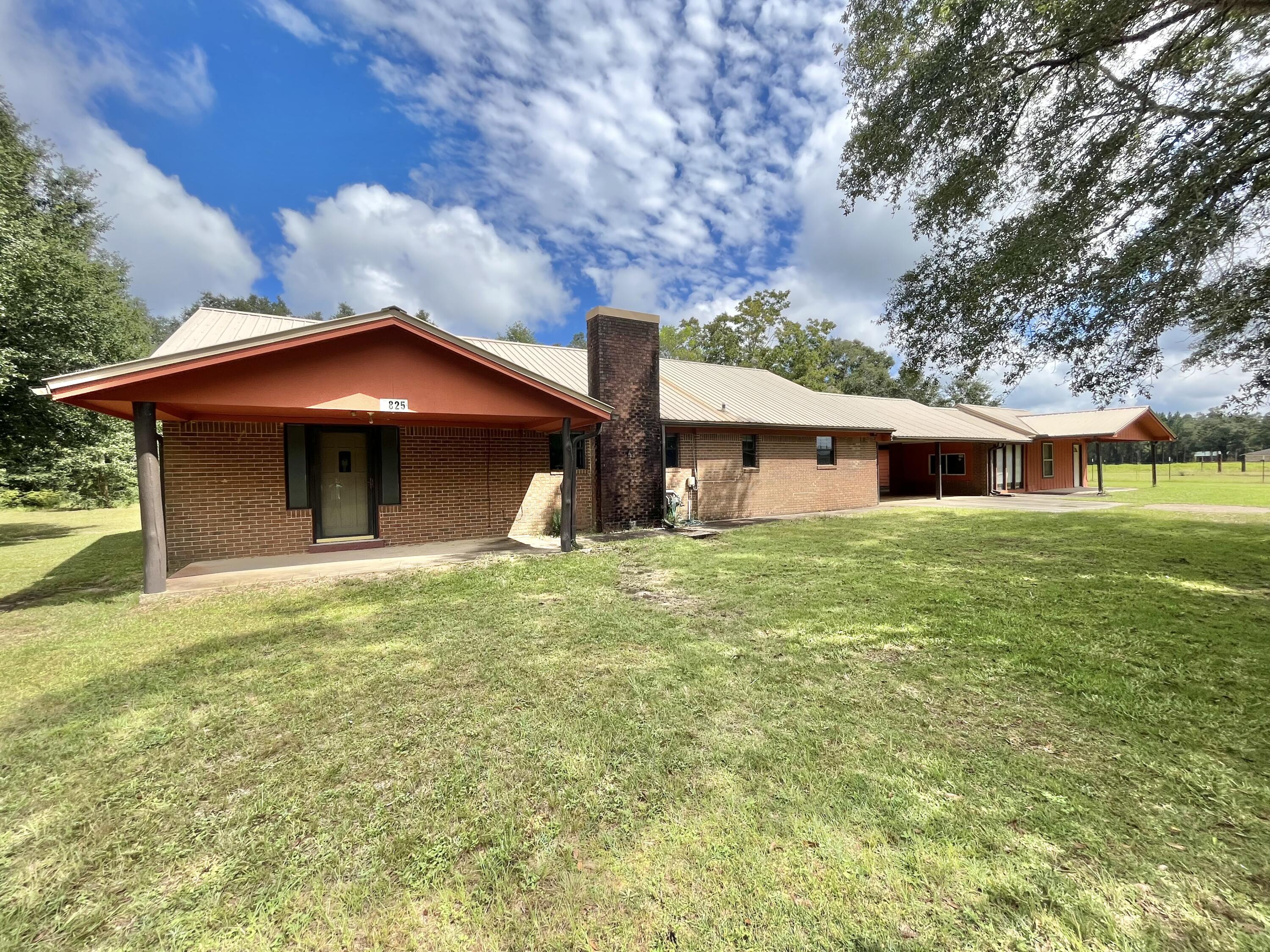 4825 Griffith Road Holt, FL 32564 - Photo 1 of 25 Front