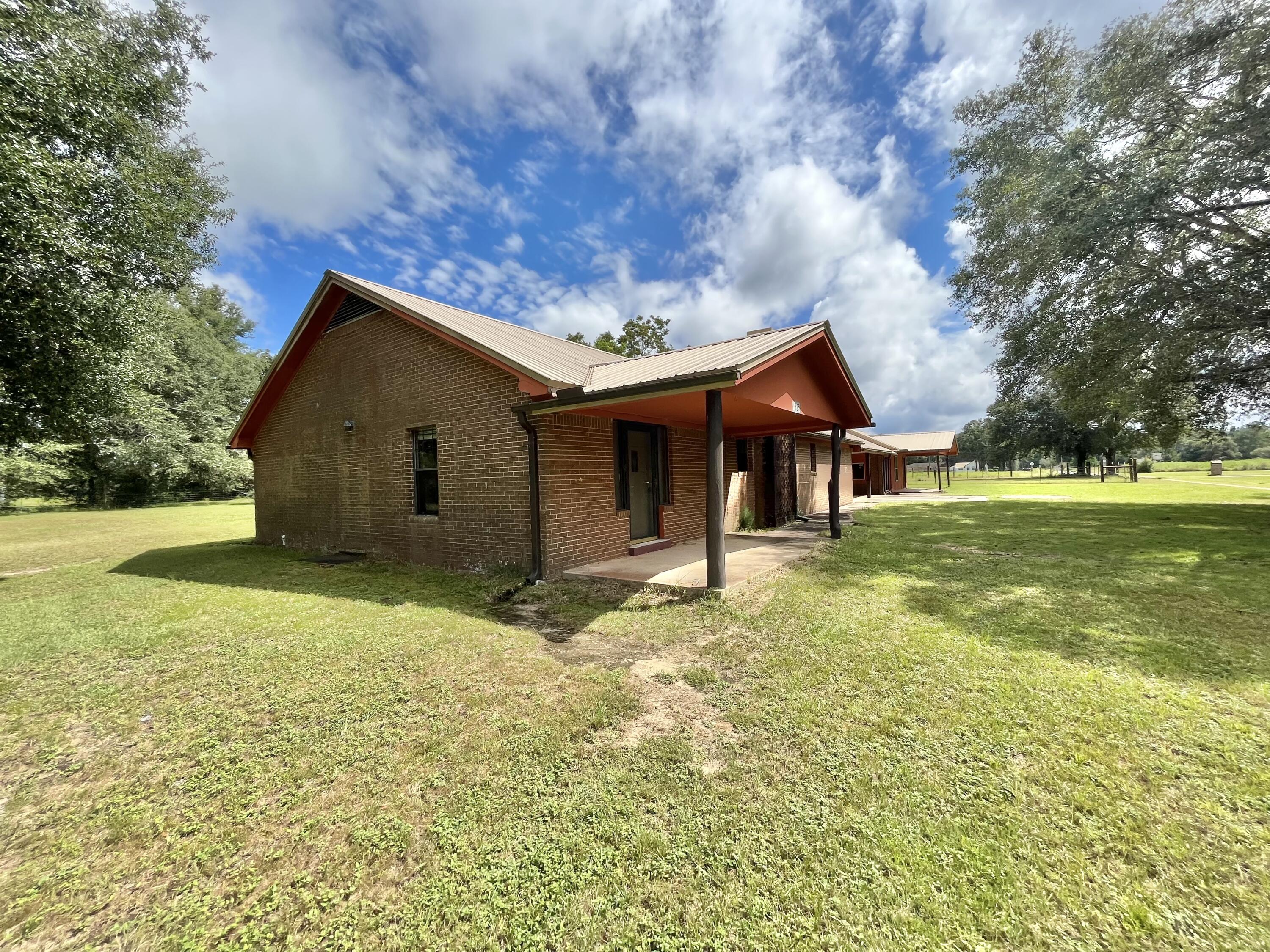 4825 Griffith Road Holt, FL 32564 - Photo 3 of 25 Side