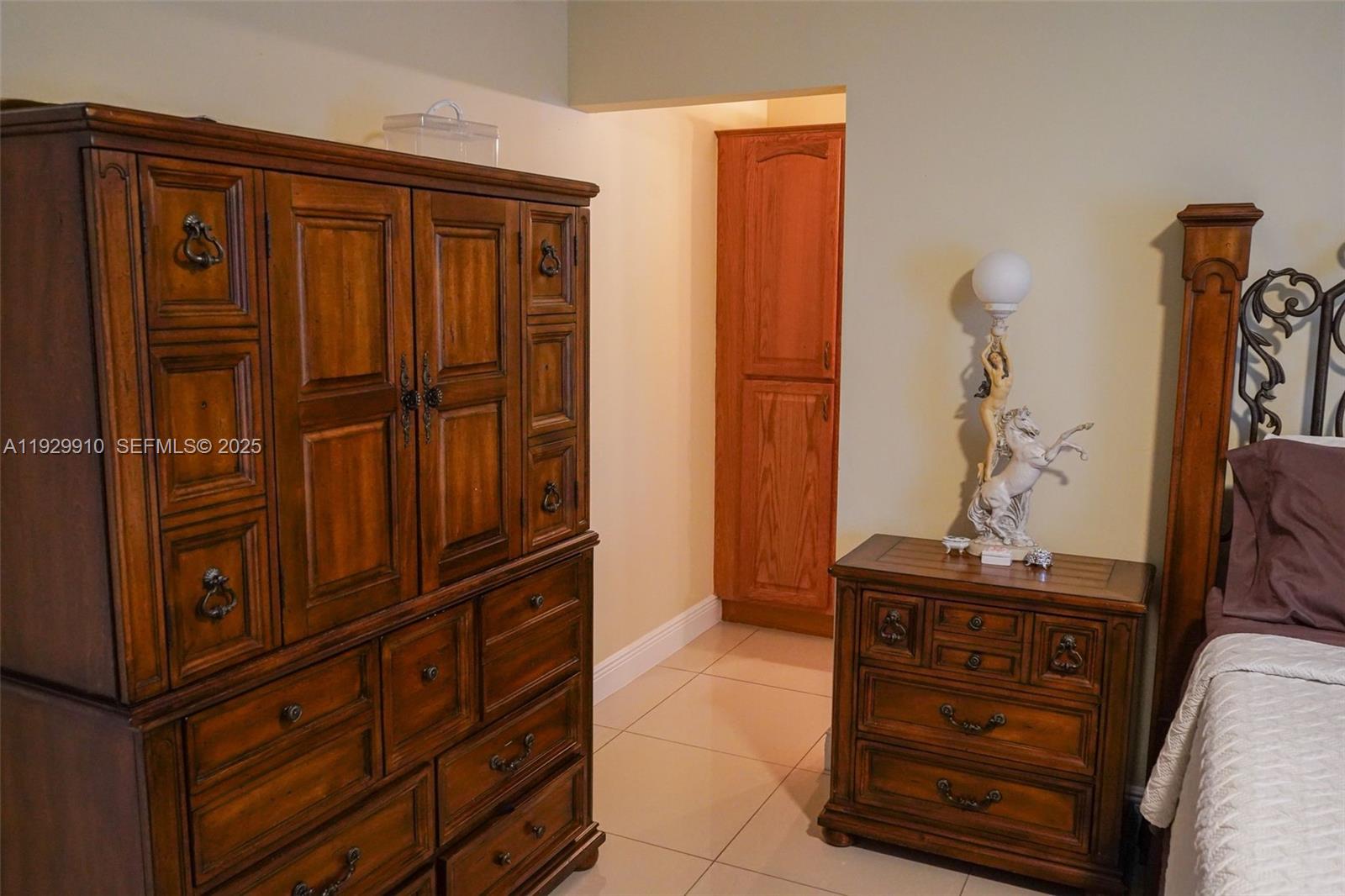 19907 Northwest 67th Court Hialeah, FL 33015 - Photo 24 of 53 a view of walk in closet