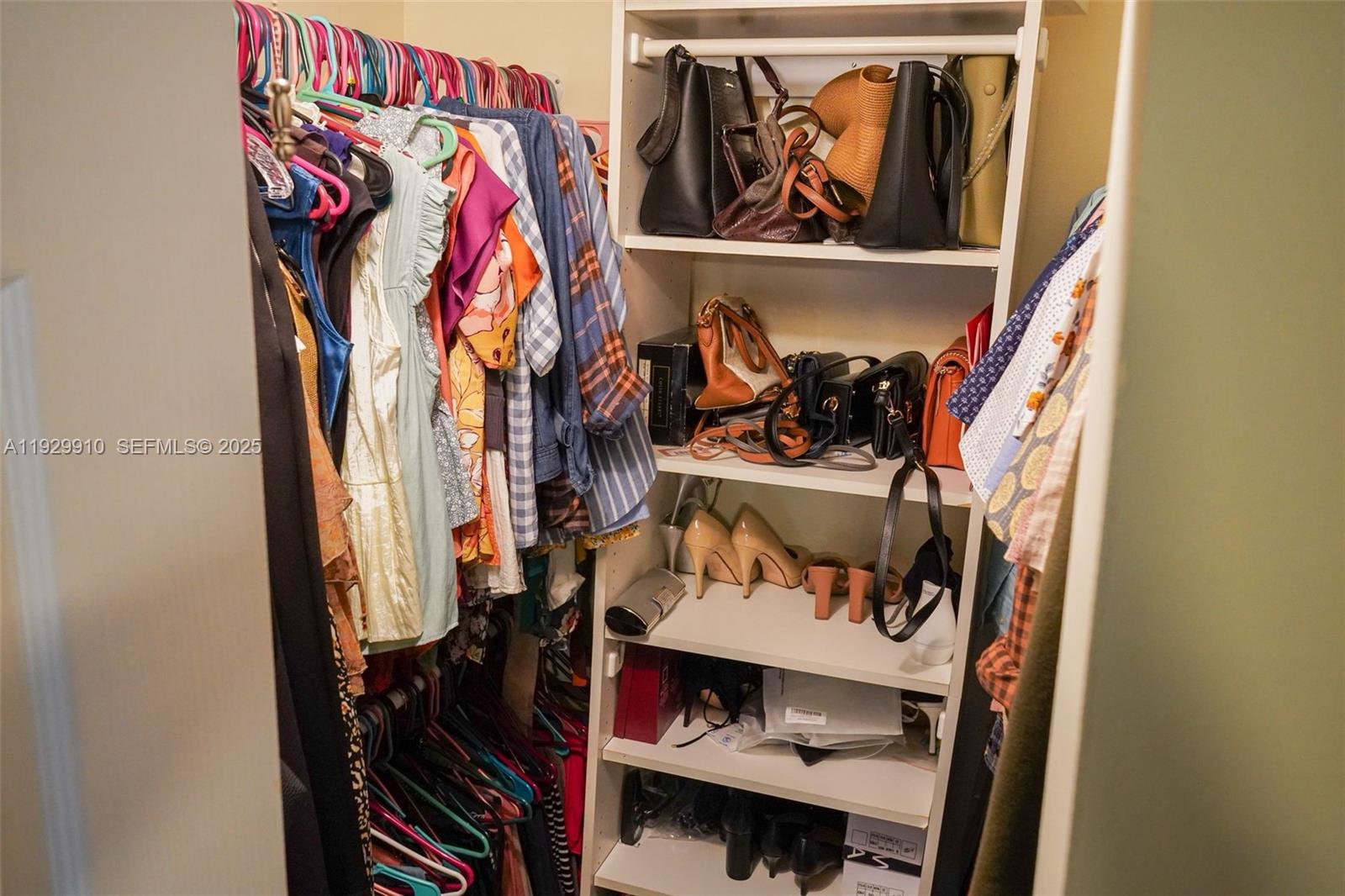 19907 Northwest 67th Court Hialeah, FL 33015 - Photo 25 of 53 a view of a closet with storage