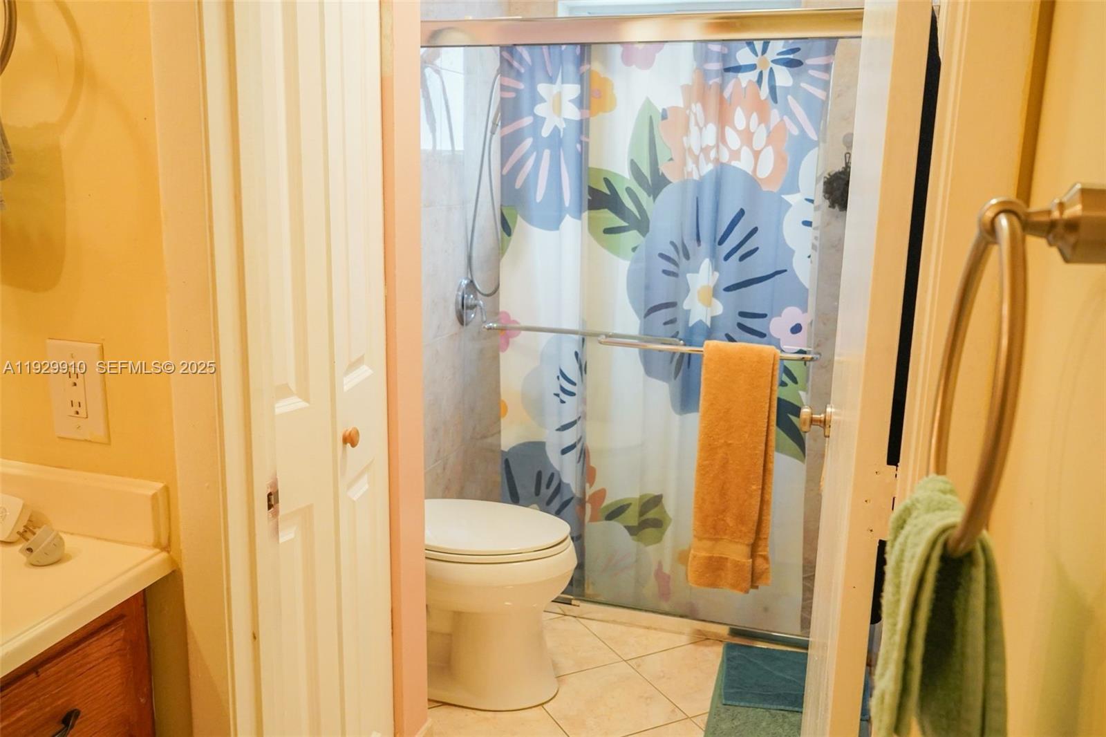 19907 Northwest 67th Court Hialeah, FL 33015 - Photo 30 of 53 a bathroom with a toilet and shower