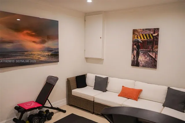 a room with furniture and stairs