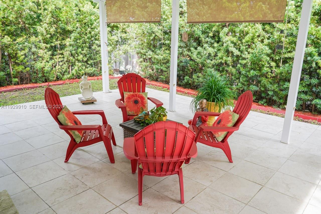 19907 Northwest 67th Court Hialeah, FL 33015 - Photo 47 of 53 a view of a two chairs in the roof deck