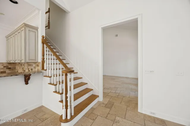 a view of a garage with stairs