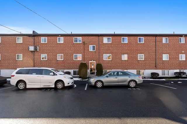 a car parked in front of a building